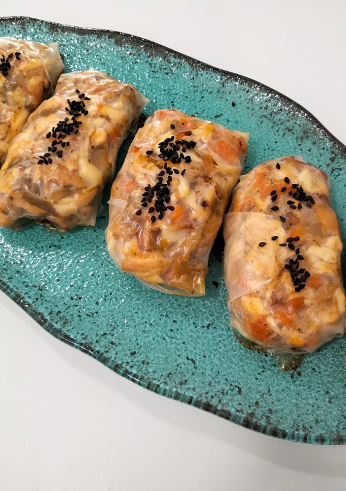 Una foto de Rollito de arroz de cocido