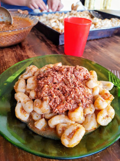 Una foto de Ñoquis con salsa boloñesa
