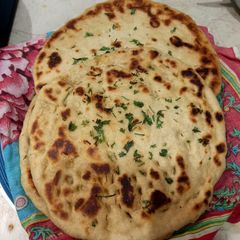 A picture of Homemade naan, whole wheat flour.