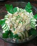 Салат с кальмарами, жареными шампиньонами, яйцами и луком