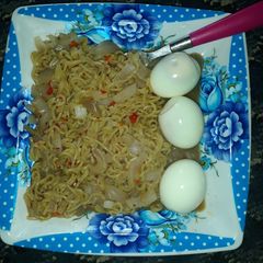 Simple Breakfast with Noodles and Cooked Eggs A picture of Simple Breakfast with Noodles and Cooked Eggs.