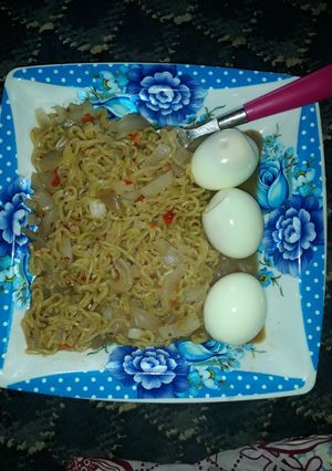 A picture of Simple Breakfast with Noodles and Cooked Eggs.