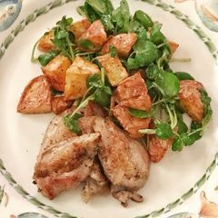 A picture of Sous vide quail breasts with warm potato and watercress salad.