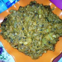 A picture of Porridge Beans mixed with Sweet Potatoes and Ripe Plantain.
