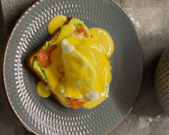 The New Way Cooking Recipe Breakfast poached egg toast with avocado cream salmon and hollandaise Restaurant Style