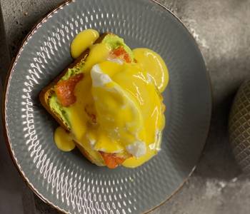 Ready to Serve Breakfast poached egg toast with avocado cream salmon and hollandaise Delicious Simple