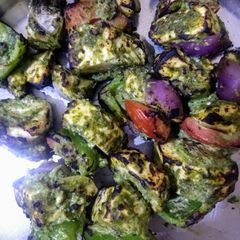 A picture of Pahaadi paneer tikka or hariyali paneer tikka.