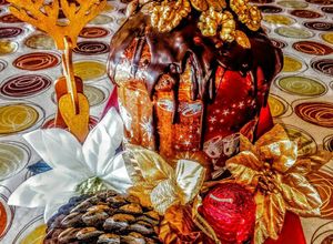 Una foto de Pan dulce esponjoso con chips de chocolate, nueces y almendras