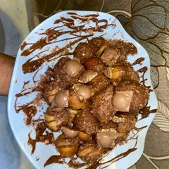 A picture of Chocolate glazed Puff puff.