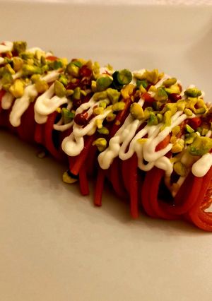 A picture of Spaghetti with Beet Cream.