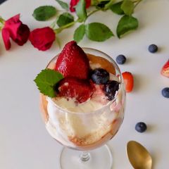 A picture of Berry Tiramisu in wineglass.