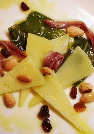 A picture of Roasted Pepper, Anchovy, and Manchego Cheese Tapas.