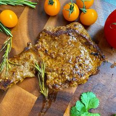 A picture of Beef Steak with Herbs and Spices.