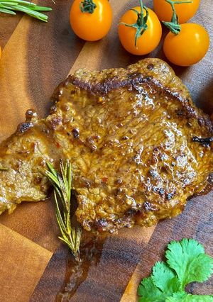 A picture of Beef Steak with Herbs and Spices.