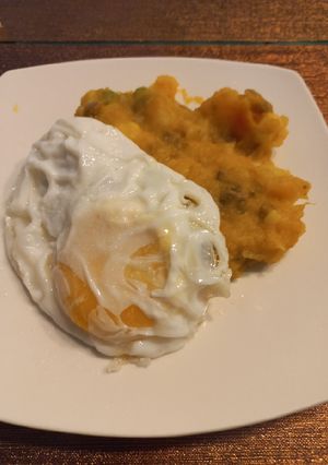 Una foto de Charquicán con huevo