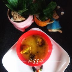A picture of Moong Dal with Hilsa fish.