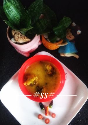 A picture of Moong Dal with Hilsa fish.