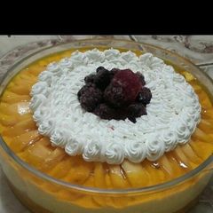 A picture of Mango mousse cheese cake dessert.