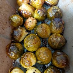 A picture of My Roasted Peppered Sprouts 💜💛.