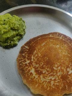 A picture of Instant rava coconut puda/aapam (pancake) with coconut chatani.