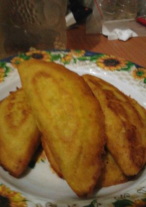 Una foto de Empanadas de plátano macho y auyama rellenas de soja y arroz