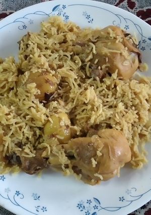 A picture of Chicken biryani with potatoes.