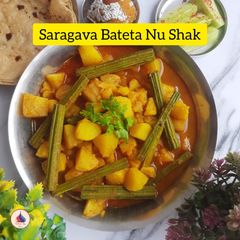 A picture of Saragava Bateta nu Shak (drumstick potato curry).