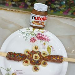 A picture of Banana sticks and Nutella spread bread flower.