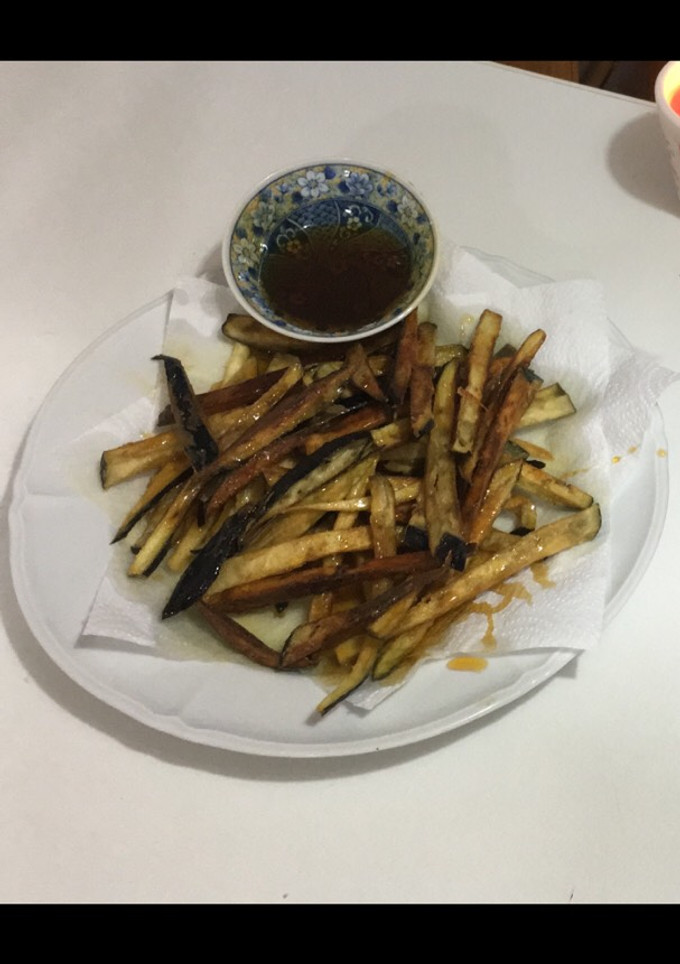 Una foto de Berenjenas fritas con miel