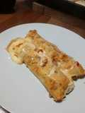 Canelones rellenos de pollo y verdeo con salsa de crema