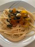 Spaghetti con tomates confitados