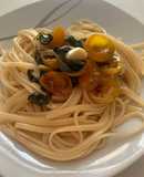 Spaghetti con tomates confitados