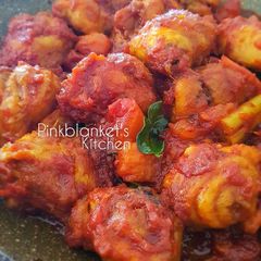A picture of Chicken in Tomato Sauce.