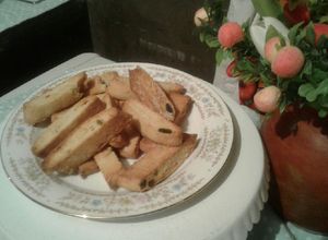 Una foto de Biscotti de naranja y frutillas