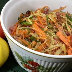 A picture of Colorful Vegetables fry with Bacon.