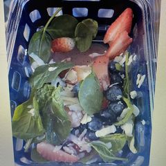 A picture of Strawberry, blueberries spinach salad.