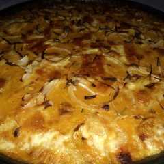 Una foto de Pastel mix de carnes y puré