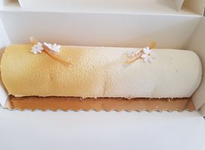 Une photo de Bûche de noël Grand Marnier insert mandarine