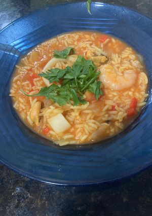 Una foto de Paella