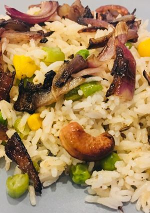 A picture of Cumin peas pulav.