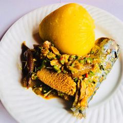 A picture of Okro soup with eba.