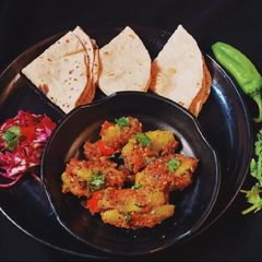 A picture of Bharwa Parwal (Stuffed Pointed Gourd).