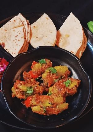 A picture of Bharwa Parwal (Stuffed Pointed Gourd).