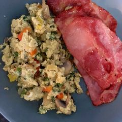 A picture of Brunch Eggs and bacon.