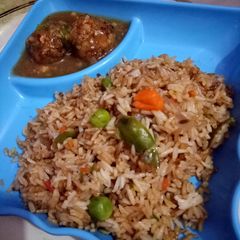 Munchurian and fried rice A picture of Munchurian and fried rice.