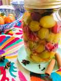 Uvas en almíbar especiado y licor