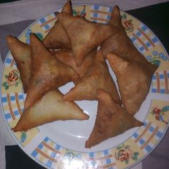 A picture of Scramble egg filled samosas.