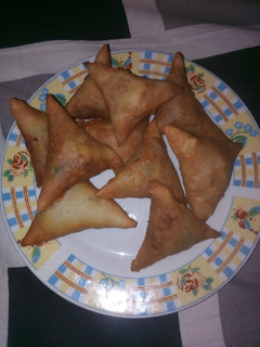 A picture of Scramble egg filled samosas.