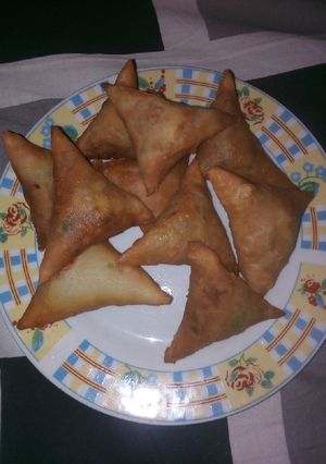 A picture of Scramble egg filled samosas.