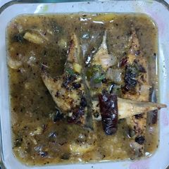A picture of Lemon garlic Grilled fish pamphlets with pineapple sauce.